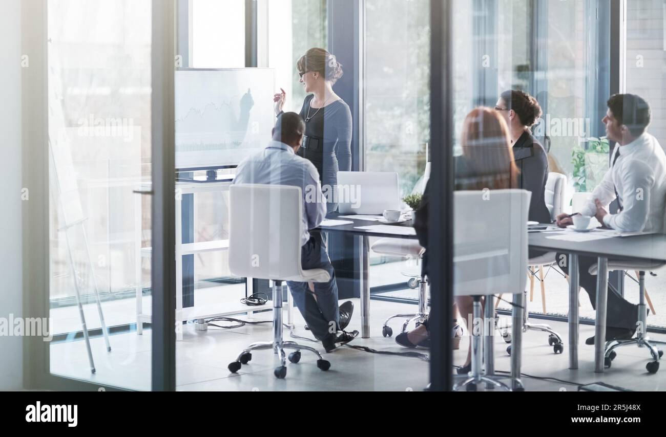 Corporate movers and shakers in action. an executive giving a