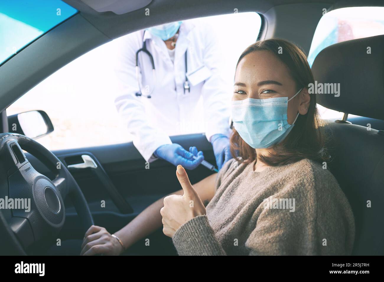 My safety matters and so does yours. a masked young woman receiving an ...