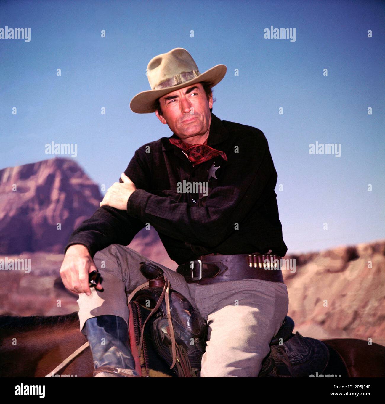 GREGORY PECK in MACKENNA'S GOLD (1969), directed by J. LEE THOMPSON. Credit: COLUMBIA PICTURES / Album Stock Photo