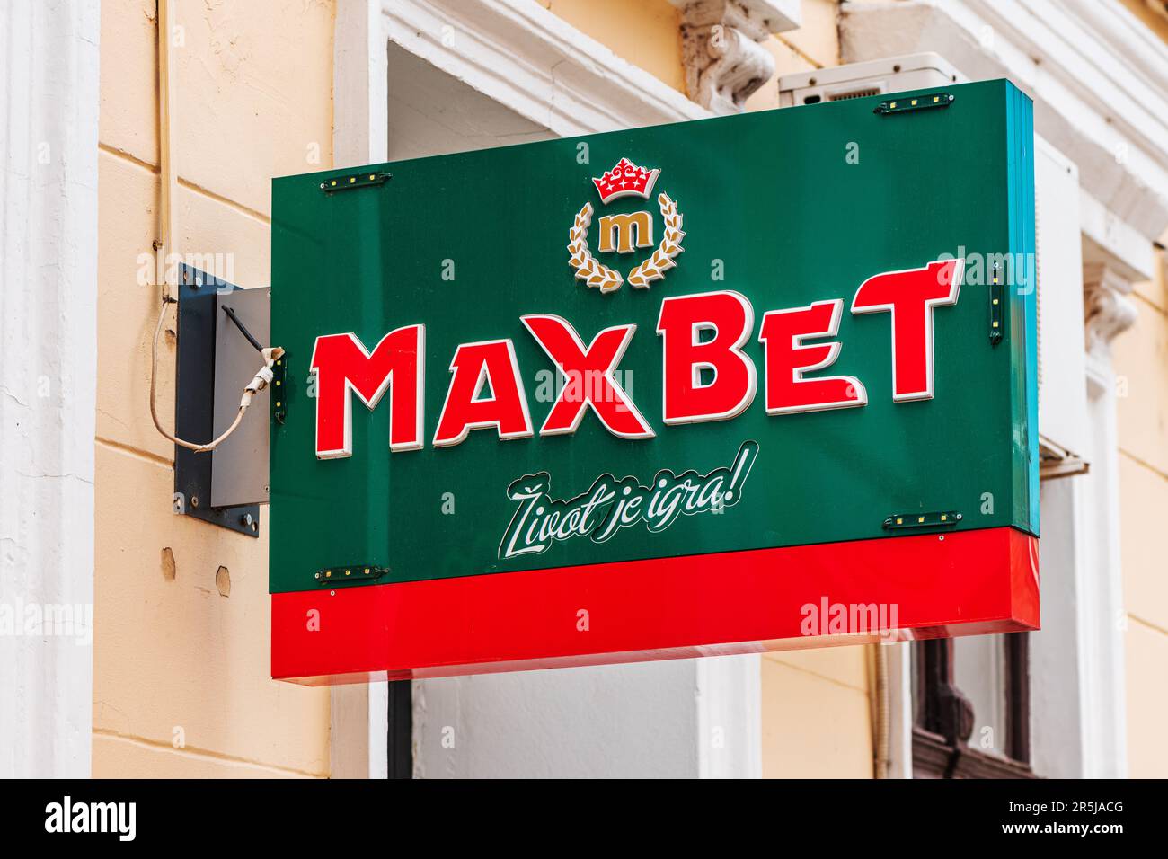 Zrenjanin, Serbia - April 29, 2023: Maxbet sign board. This is casino and betting, gambling and slot machine parlors company from Serbia Stock Photo