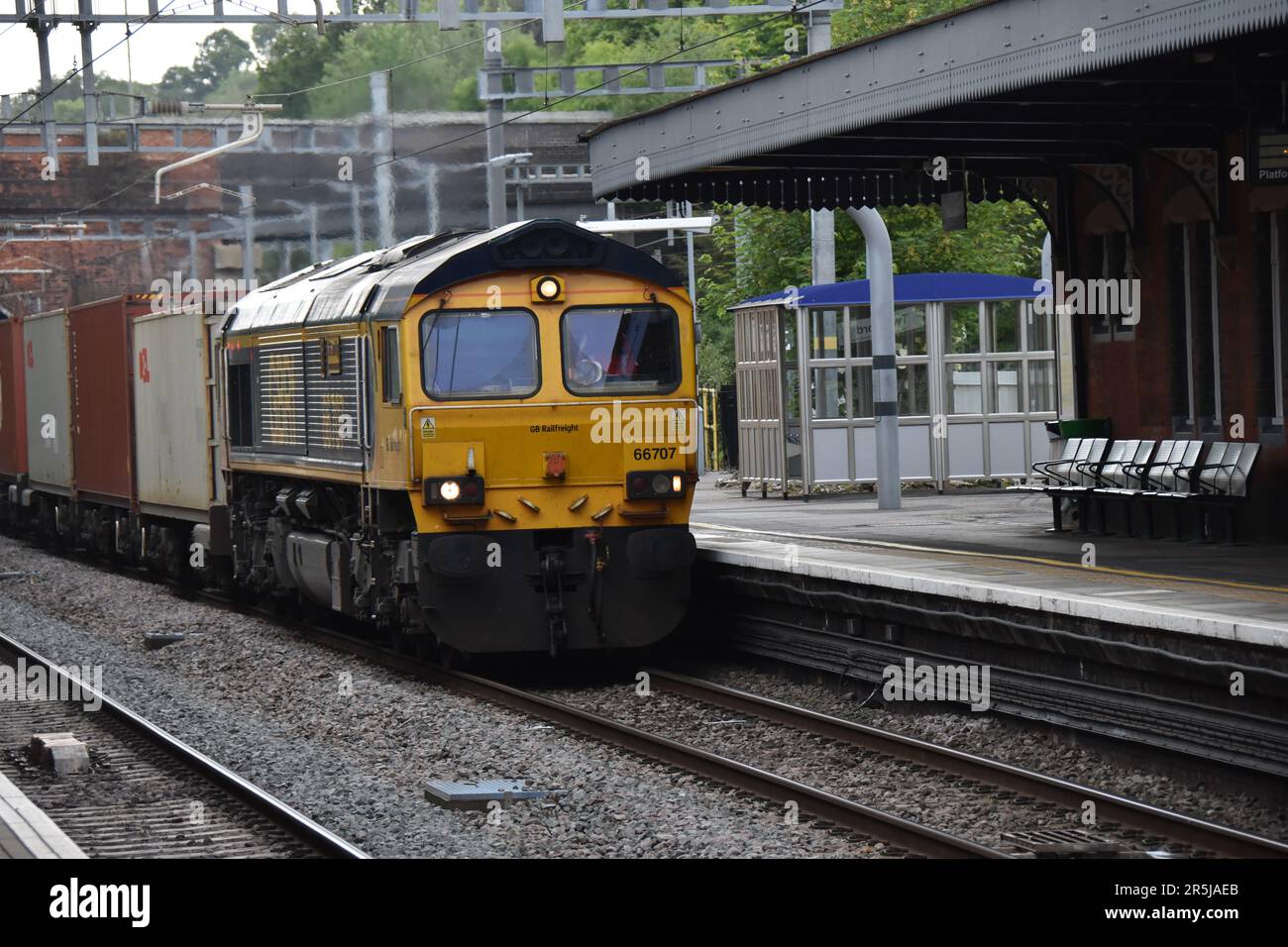 Class 66 No 66707 Hauling a Freight Train Through Twyford Berkshire on 3rd June 2023 Stock Photo