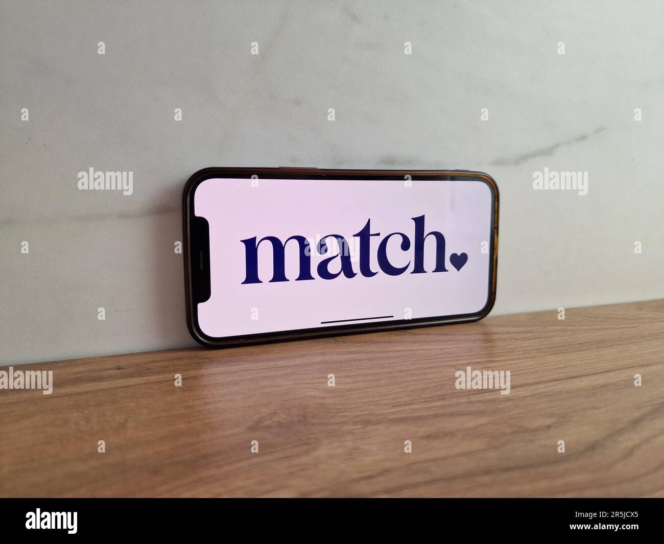 Konskie, Poland - May 28, 2023: Match dating website logo displayed on mobile phone screen Stock Photo