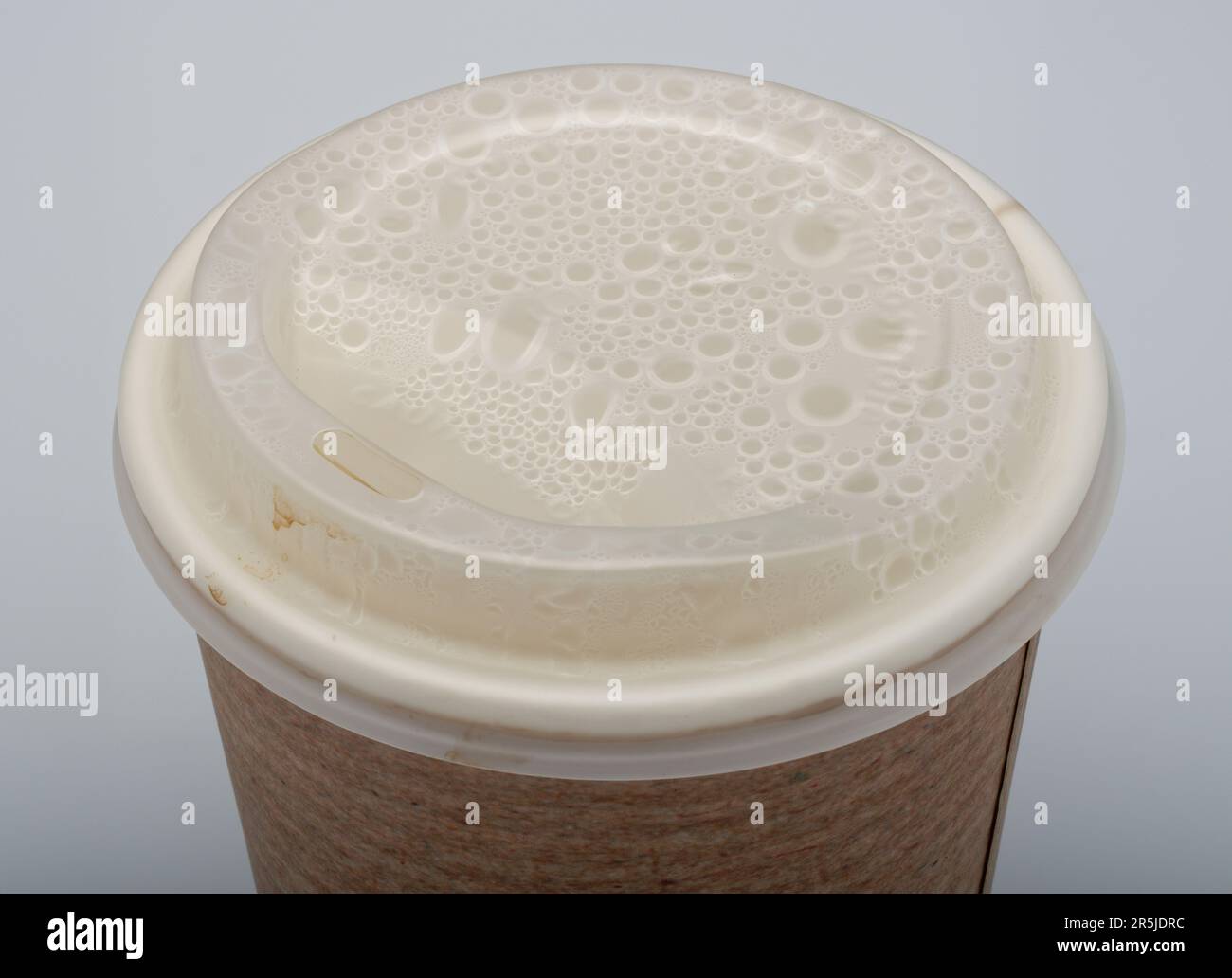 Coffee cup lid with steam droplets condensation. A disposable coffee ...