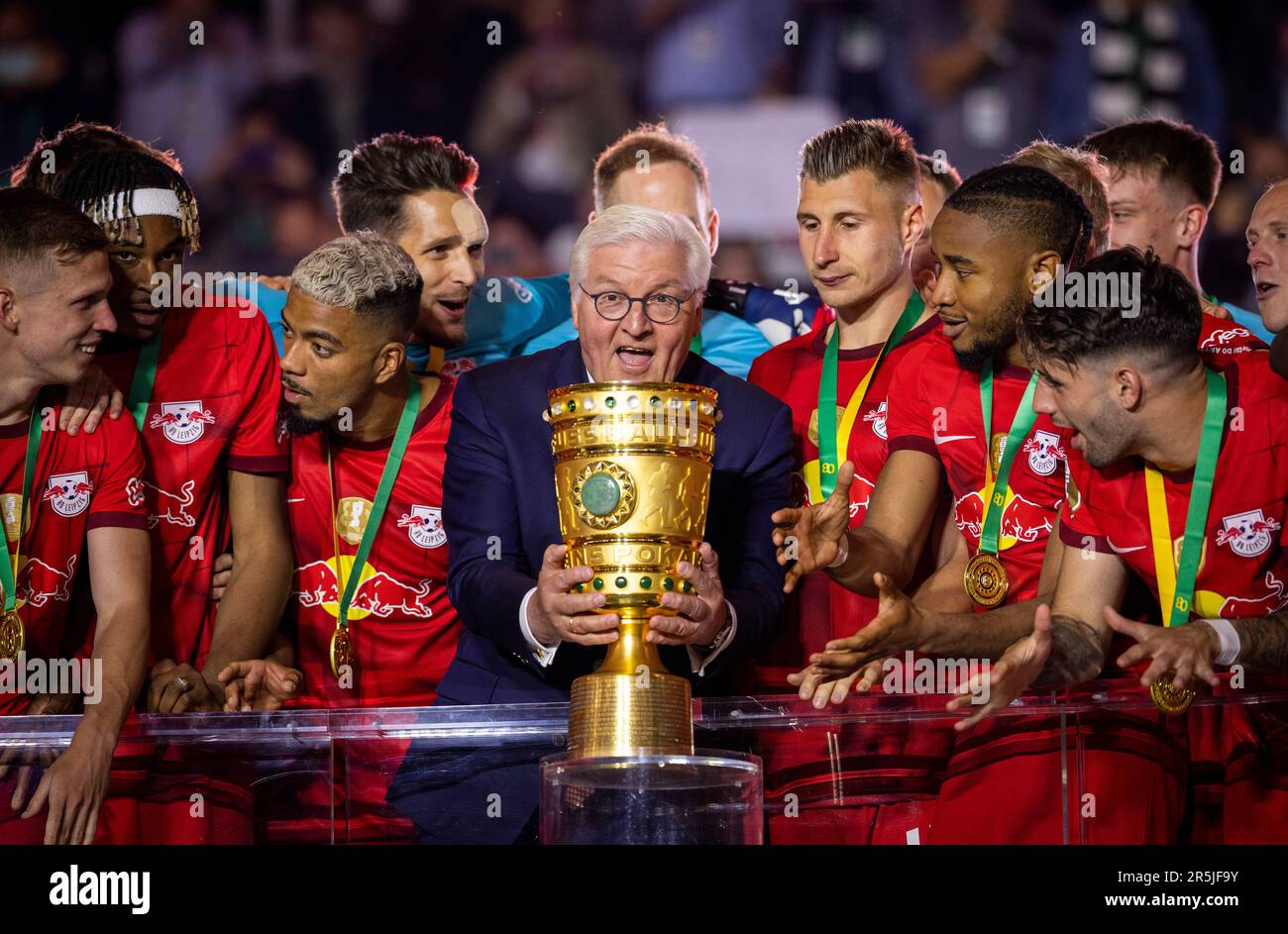 Berlin, Germany. 3rd Jun, 2023.  Frank-Walter Steinmeier (Bundespräsident der Bundesrepublik Deutschland) übergibt den den Pokal an Willi Orban (RBL) Stock Photo