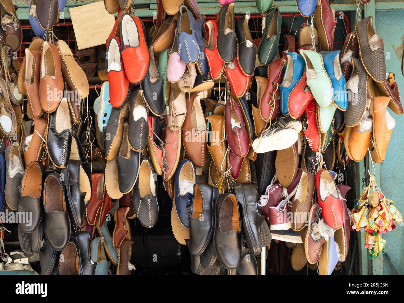 Colorful Footwear manufacturing handmade, called ''Yemeni'' hanging