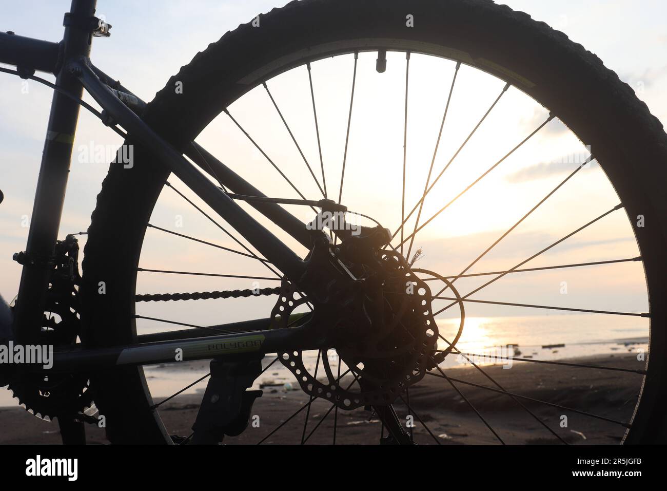 wheel of bike bicycle by the beach in the morning Stock Photo Alamy