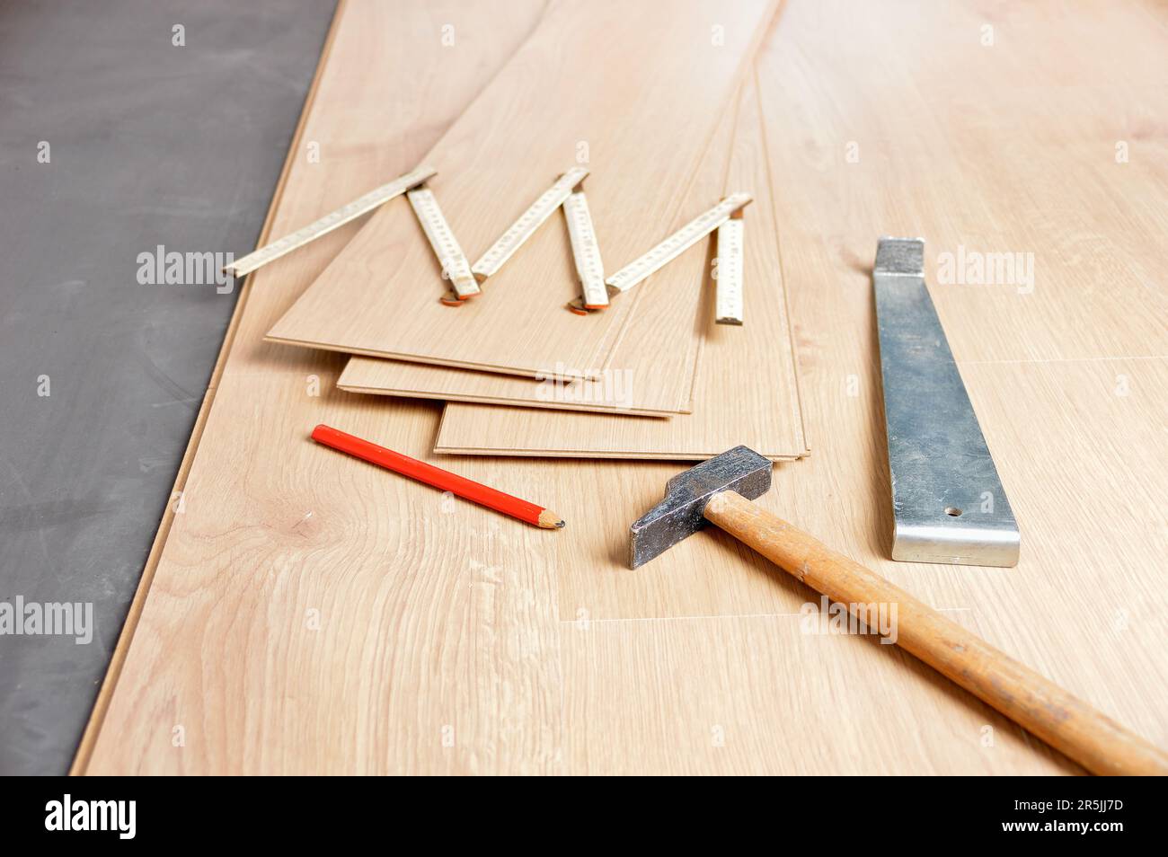 Group of tools to laying laminate at home Stock Photo