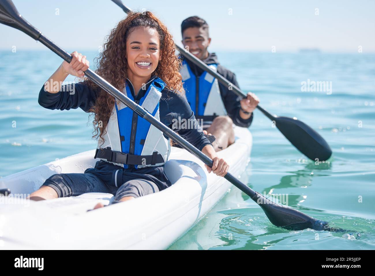 Kayak holiday and couple at a lake summer break and happiness