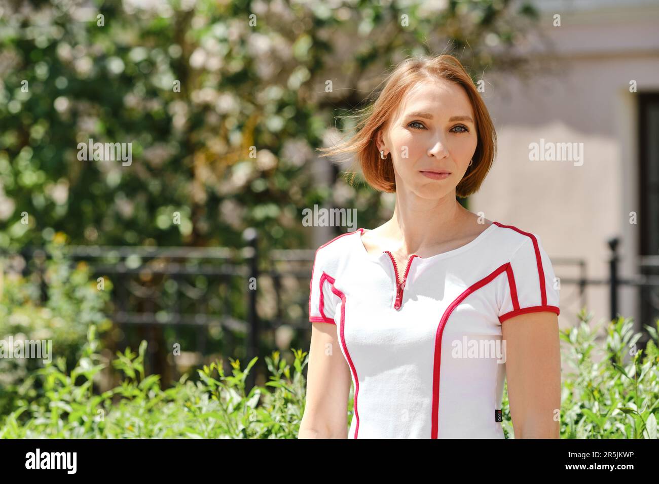 Medium closeup portrait of fitness sport redhead woman Stock Photo