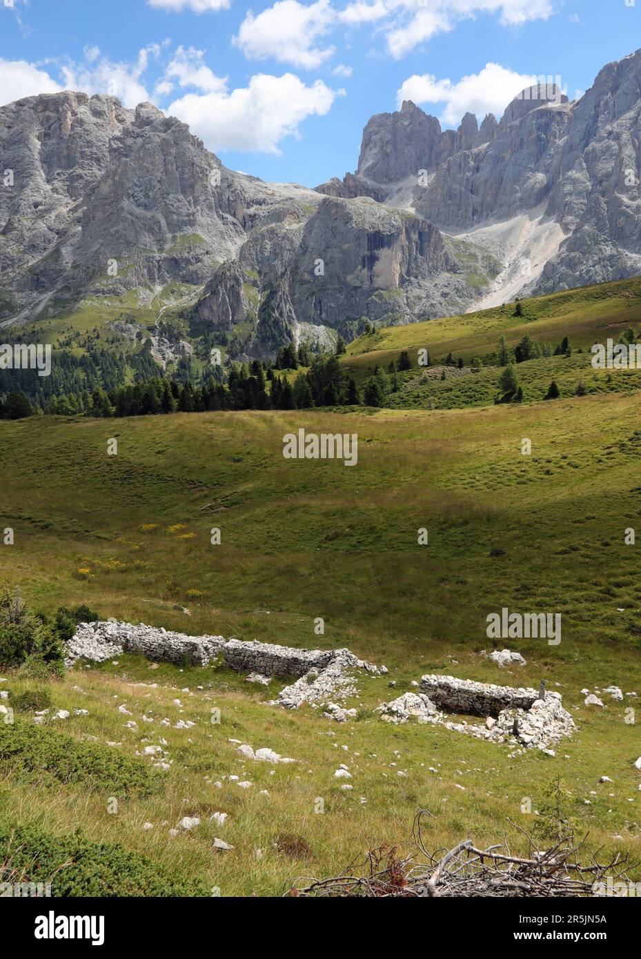 panorama of the European Alps and the traces of the rubble of an old military barracks from the First World War Stock Photo