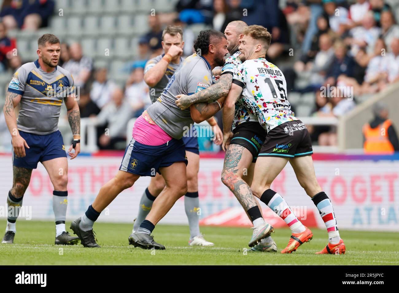 Wakefield Trinity’s David Fifita (centre) and Leigh Leopards’ Ben