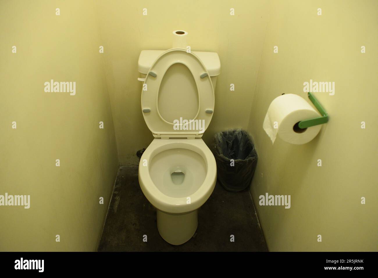 Classic sparse American public institutional restroom, bathroom, water