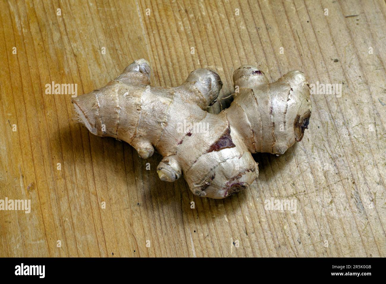 Kitchen ingredients, spice: root of ginger, isolated Stock Photo