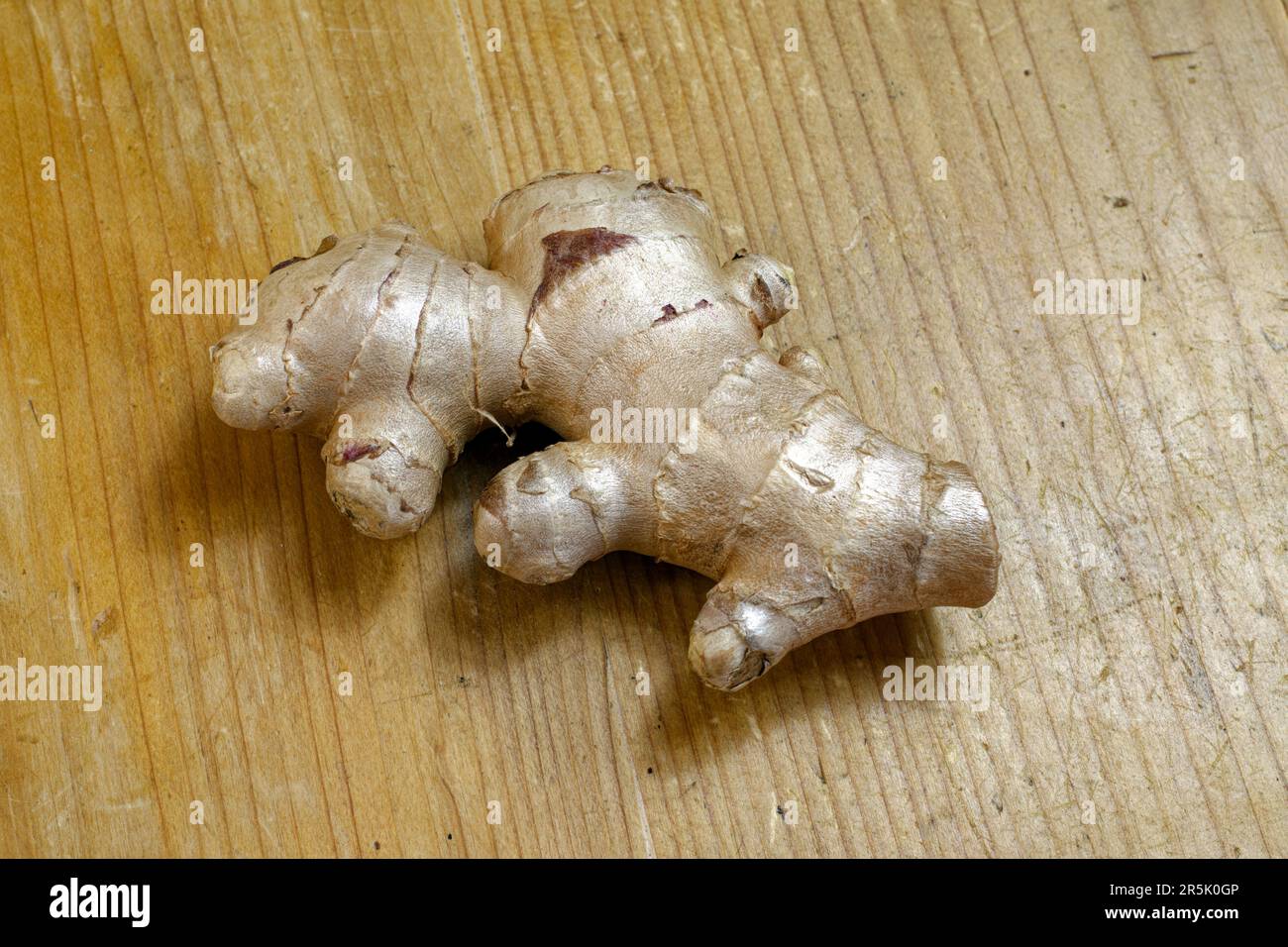 Kitchen ingredients, spice: root of ginger, isolated Stock Photo