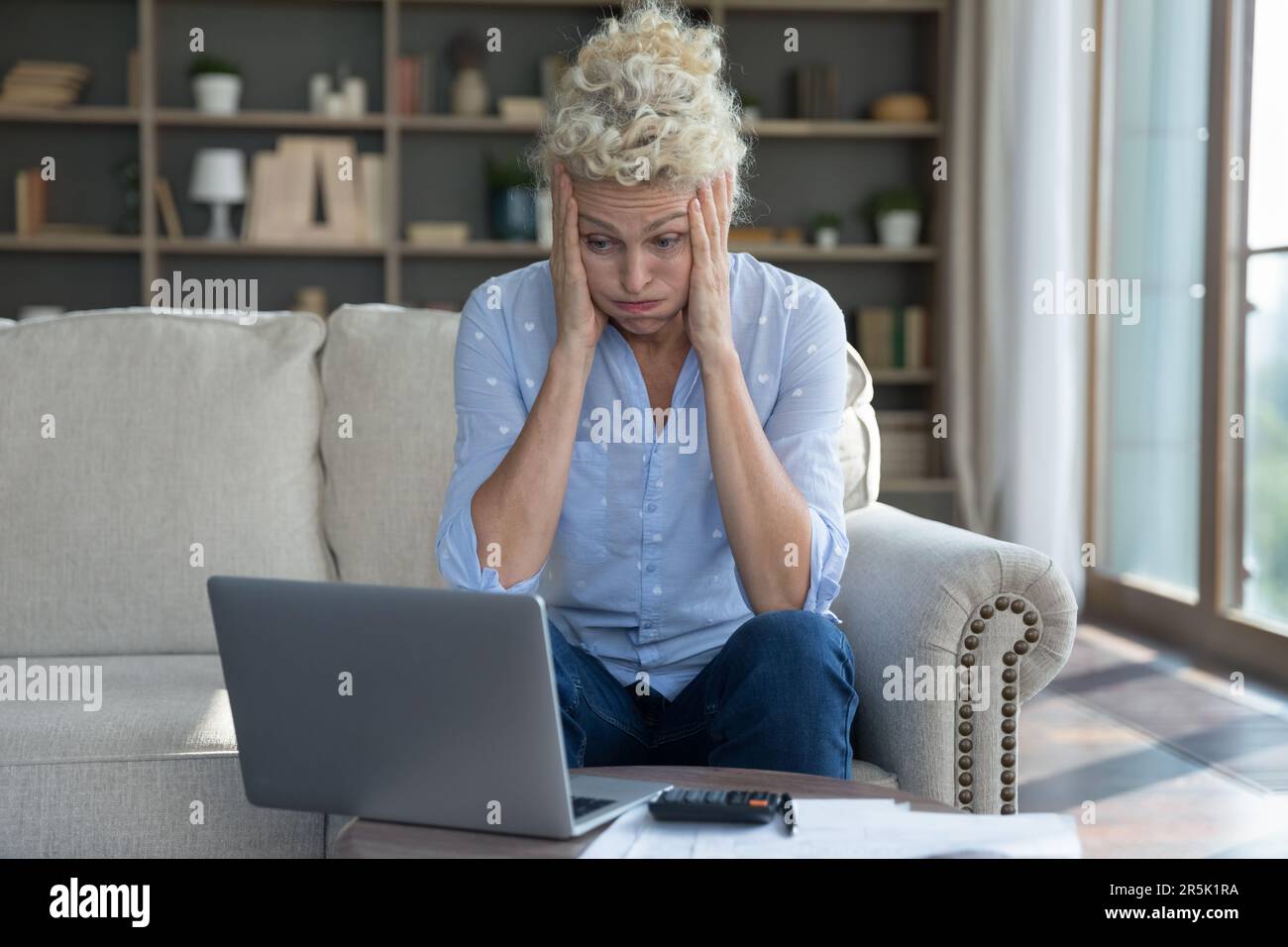 Frustrated mature woman expense hi-res stock photography and images - Alamy