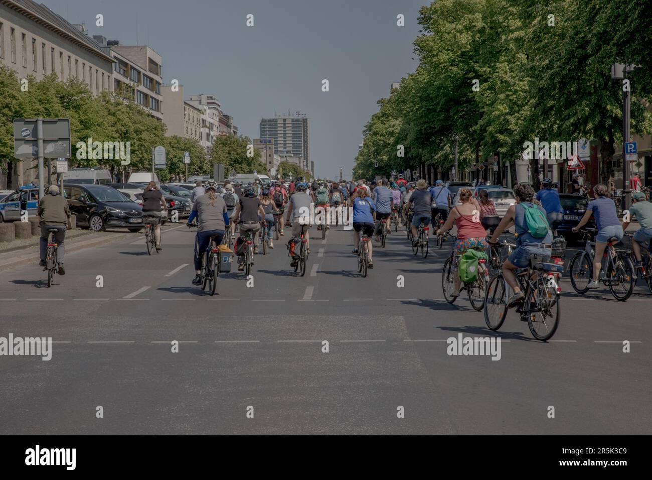 Thousands of cyclists participated in the annual bike protest, the Sternfahrt, in Berlin on June 4, 2023. Participants called for protected bike lanes and safer streets around schools. Numerous roads in and around Berlin were closed to car traffic to accommodate the event, including sections of freeways. The action caused significant disruptions for motorists throughout the city. All routes converged at the Victory Column in Berlin's Tiergarten Park. Road closures were also implemented on the A113/A100 and A115 (AVUS) freeways. The General German Bicycle Club (ADFC) estimated tens of thousands Stock Photo