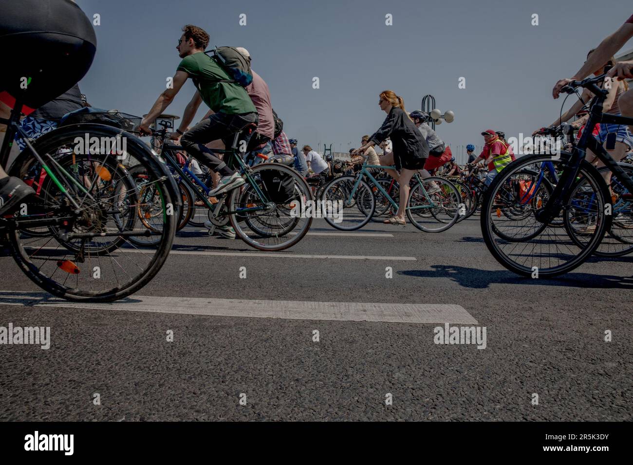 Thousands of cyclists participated in the annual bike protest, the Sternfahrt, in Berlin on June 4, 2023. Participants called for protected bike lanes and safer streets around schools. Numerous roads in and around Berlin were closed to car traffic to accommodate the event, including sections of freeways. The action caused significant disruptions for motorists throughout the city. All routes converged at the Victory Column in Berlin's Tiergarten Park. Road closures were also implemented on the A113/A100 and A115 (AVUS) freeways. The General German Bicycle Club (ADFC) estimated tens of thousands Stock Photo