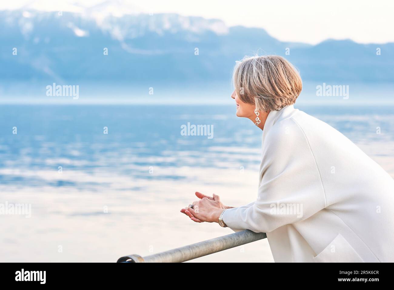 Mature woman admiring lake hi-res stock photography and images - Alamy