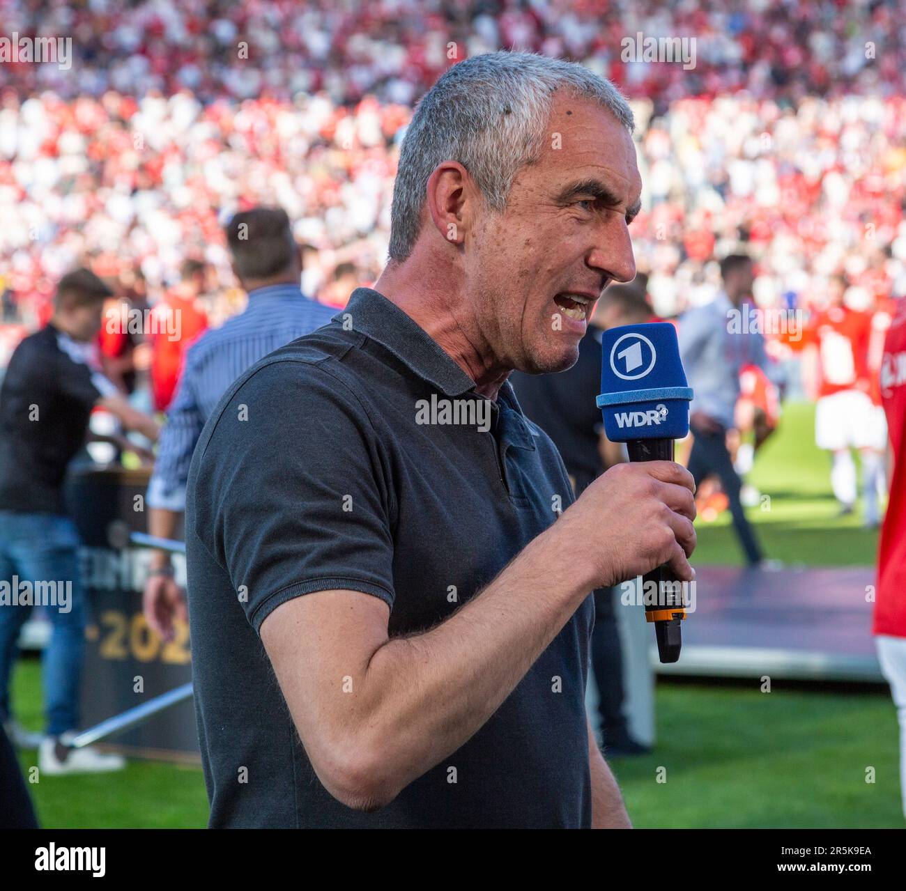 sports, football, Lower Rhine Cup, 2022/2023, final, Rot Weiss Essen vs. Rot Weiss Oberhausen 2-0, Stadium Essen, Hafenstrasse, Essen is the cup winner, manager Marcus Uhlig (RWE) interviewed by WDR, DFL REGULATIONS PROHIBIT ANY USE OF PHOTOGRAPHS AS IMAGE SEQUENCES AND/OR QUASI-VIDEO Stock Photo