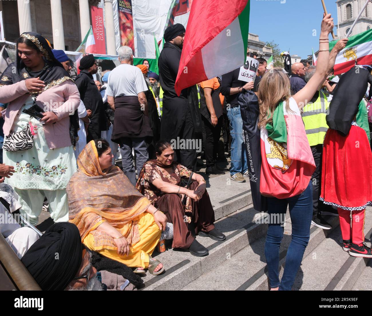 Trafalgar Square, London, UK. 4th June 2023, Sikhs in Trafalgar Square commemorate the 1984 Amritsar Golden Temple massacre. A group of Iranians also protesting in Trafalgar Square. Credit: Matthew Chattle/Alamy Live News Stock Photo