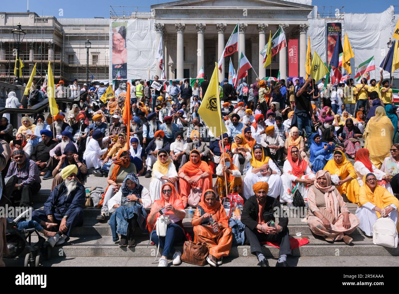 Trafalgar Square, London, UK. 4th June 2023, Sikhs in Trafalgar Square commemorate the 1984 Amritsar Golden Temple massacre. A group of Iranians also protesting in Trafalgar Square. Credit: Matthew Chattle/Alamy Live News Stock Photo