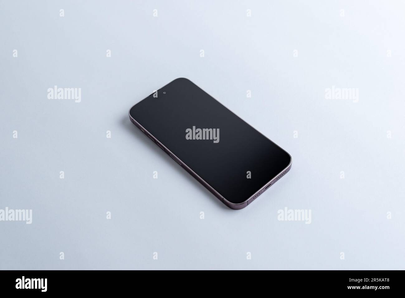 Clean and modern phone on gray desk. Isometric view for app showcase a sleek and professional aesthetic Stock Photo