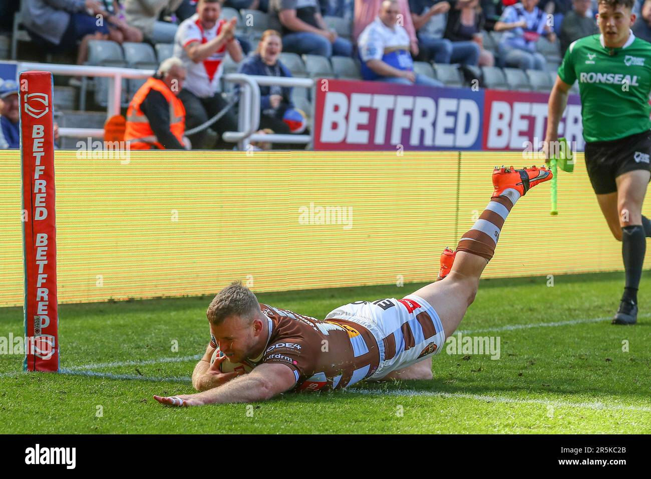 Joey Lussick #14 of St Helens goes over for a try and makes the score 46-6 during the Magic Weekend match St Helens vs Huddersfield Giants at St. James's Park, Newcastle, United Kingdom, 4th June 2023  (Photo by Gareth Evans/News Images) Stock Photo