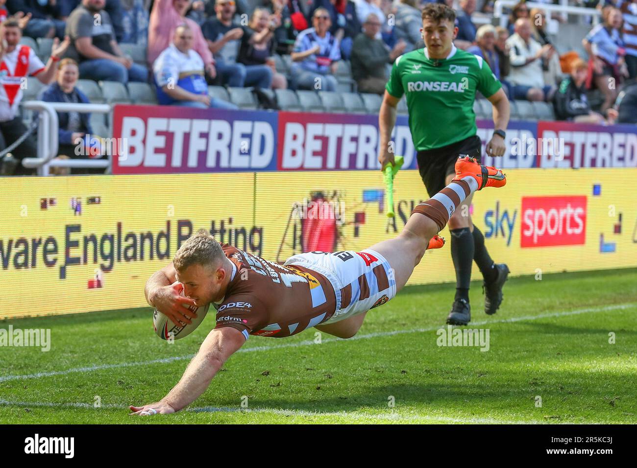 Joey Lussick #14 of St Helens goes over for a try and makes the score 46-6 during the Magic Weekend match St Helens vs Huddersfield Giants at St. James's Park, Newcastle, United Kingdom, 4th June 2023  (Photo by Gareth Evans/News Images) Stock Photo