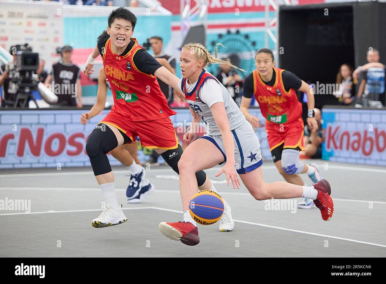 Vienna, Austria. 4th June, 2023. Hailey Van Lith (C) of the United States breaks through during the FIBA 3X3 World Cup women's semifinal match between China and the United States in Vienna, Austria, June 4, 2023. Credit: Georges Schneider/Xinhua/Alamy Live News Stock Photo
