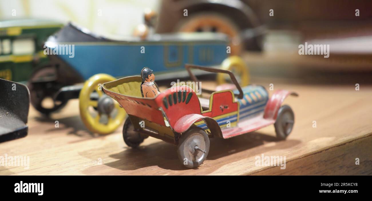 Vintage toy Die cast with galvanized steel such as cars trains. Nostalgic antique metal iron collection of old toy cars. children toys in the past. Ol Stock Photo