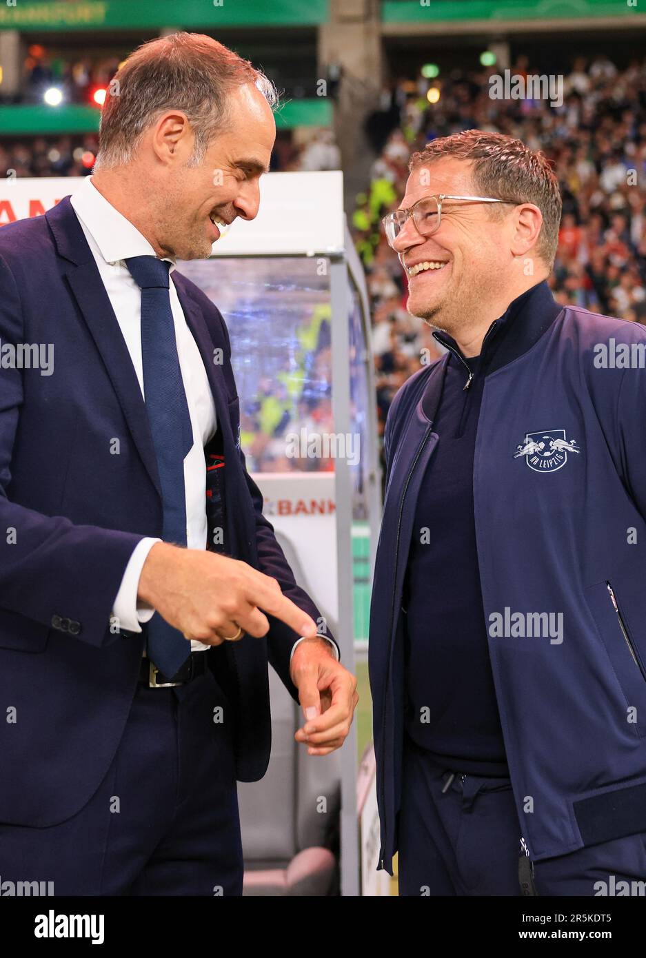 Berlin, Germany. 03rd June, 2023. Soccer: DFB Cup, final, RB Leipzig - Eintracht Frankfurt at the Olympiastadion. Leipzig's Oliver Mintzlaff (l), Managing Director Red Bull, and Max Eberl, Managing Director Sport, talk after the match. Credit: Jan Woitas/dpa - IMPORTANT NOTE: In accordance with the requirements of the DFL Deutsche Fußball Liga and the DFB Deutscher Fußball-Bund, it is prohibited to use or have used photographs taken in the stadium and/or of the match in the form of sequence pictures and/or video-like photo series./dpa/Alamy Live News Stock Photo