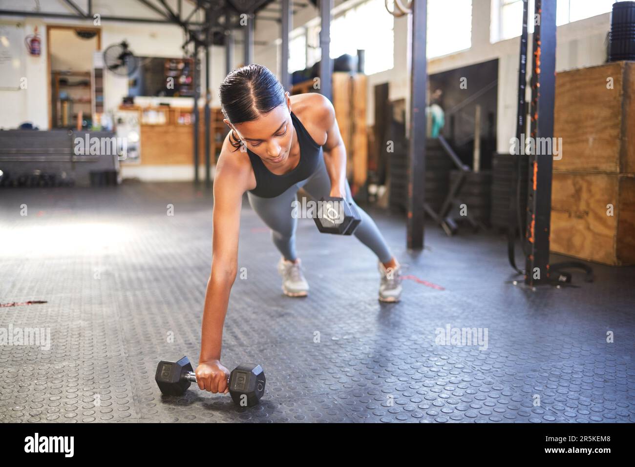 Fitness, push ups or girl athlete with dumbbells training, exercise or ...