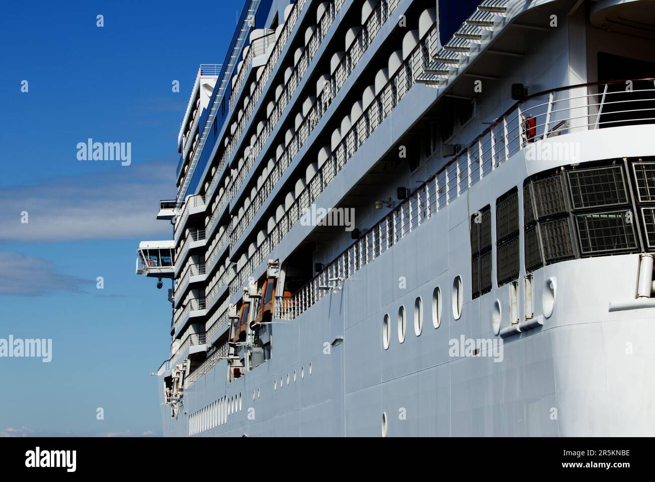 Close up of a side of cruise ship - commercial vessel Stock Photo