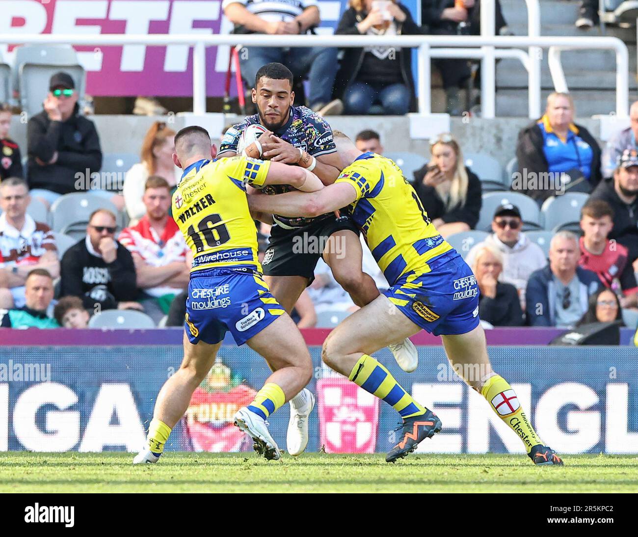 St James Park, Newcastle, UK. 4th June, 2023. Betfred Super League Magic Weekend Rugby League, Hull FC versus Warrington Wolves; Hull FC's Ligi Sao is tackled by Warrington Wolves Danny Walker and Joe Bullock Credit: Action Plus Sports/Alamy Live News Stock Photo