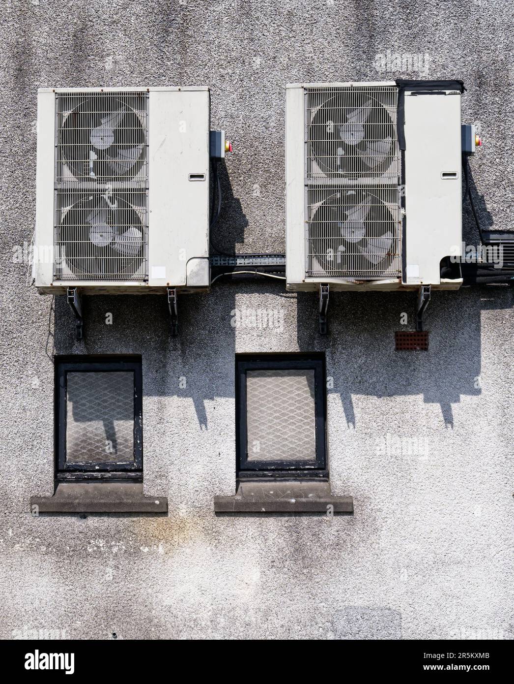 Heat pump condenser units for heating and cooling modern building Stock Photo Alamy