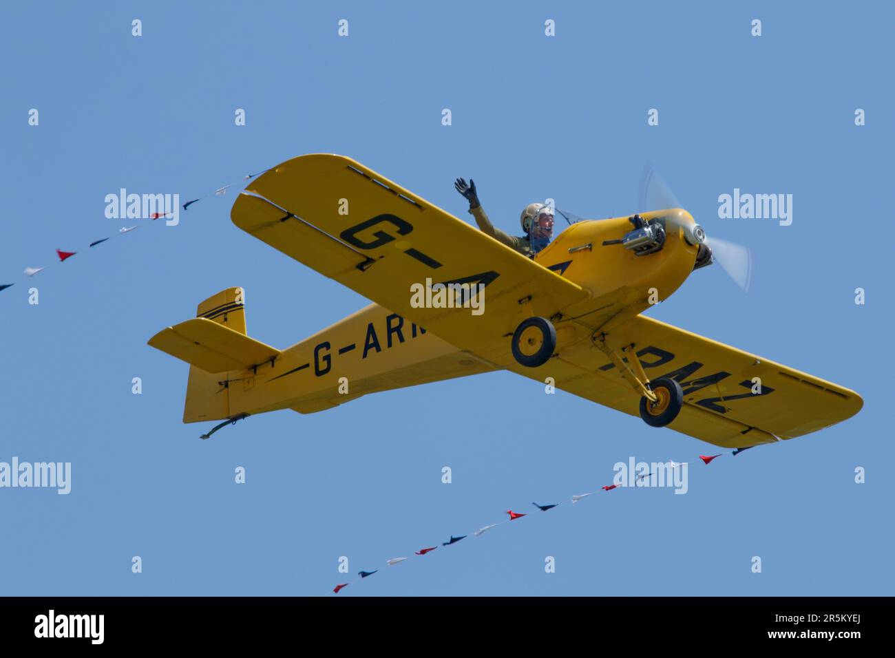 An Druine D31 Turbulent aircraft from the Turbulent team performs aerobatics at the RAF Duxford air show, 7th May 2023 Stock Photo