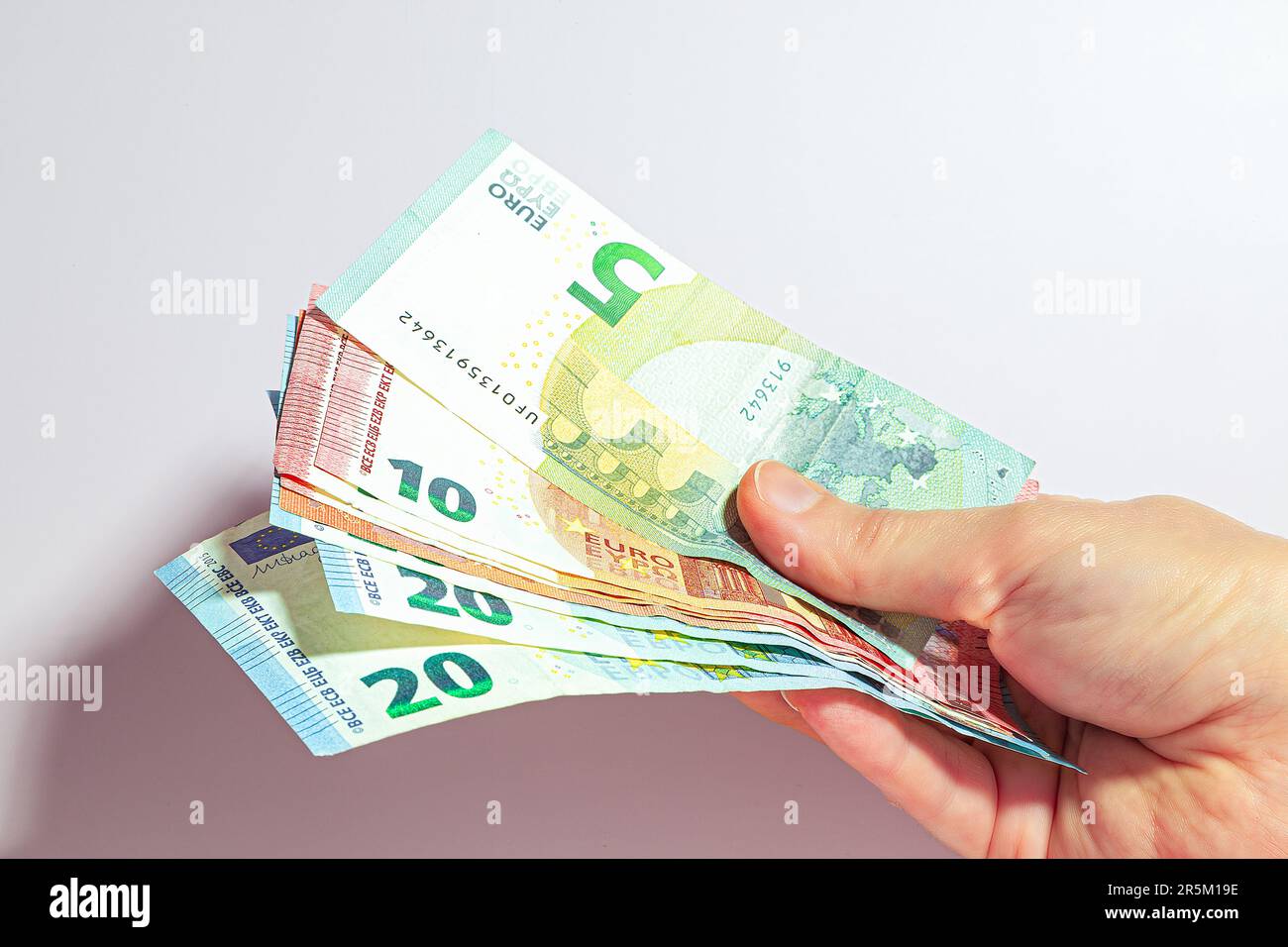 euro banknotes in hand Stock Photo