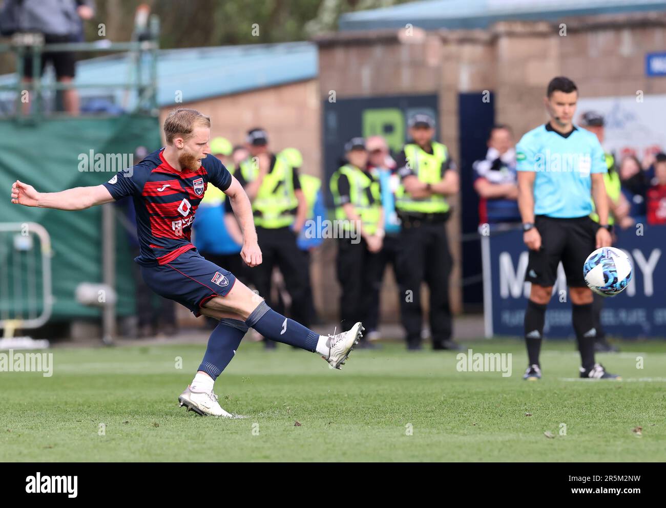 Ross County's Josh Sims scores the winning penalty in the shoot-out following the cinch Premiership second leg play-off final match at the Global Energy Stadium, Dingwall. Picture date: Sunday June 4, 2023. Stock Photo