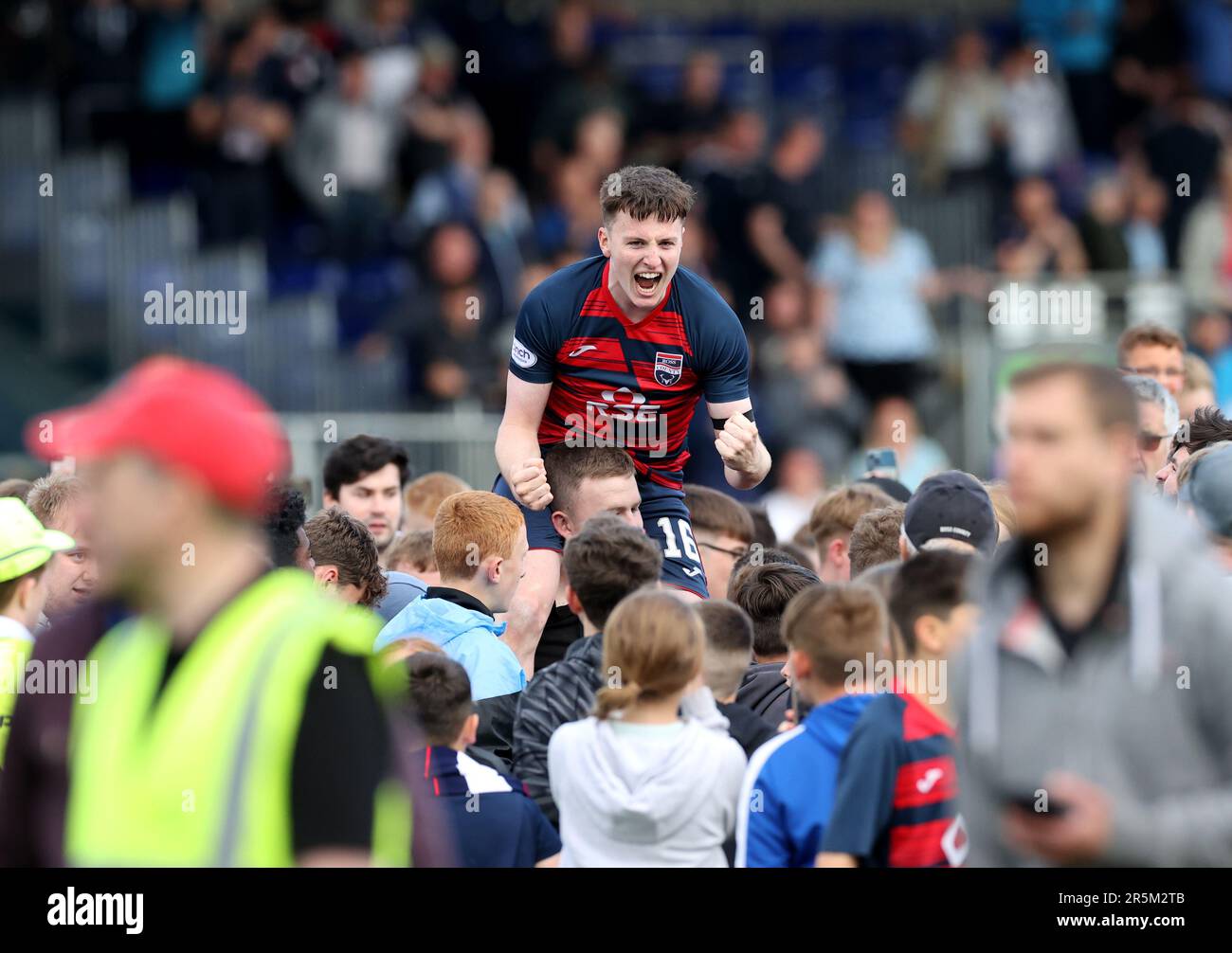 Ross County's George Harmon lifted by celebrating fans following the cinch Premiership second leg play-off final match at the Global Energy Stadium, Dingwall. Picture date: Sunday June 4, 2023. Stock Photo