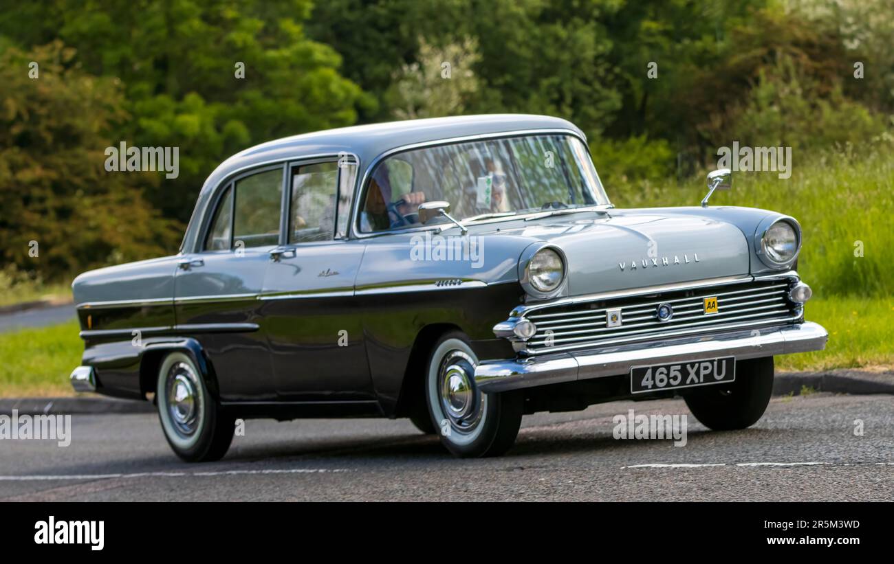 Stony Stratford,UK - June 4th 2023: 1961 Vauxhall Victor Deluxe  classic car travelling on an English country road. Stock Photo