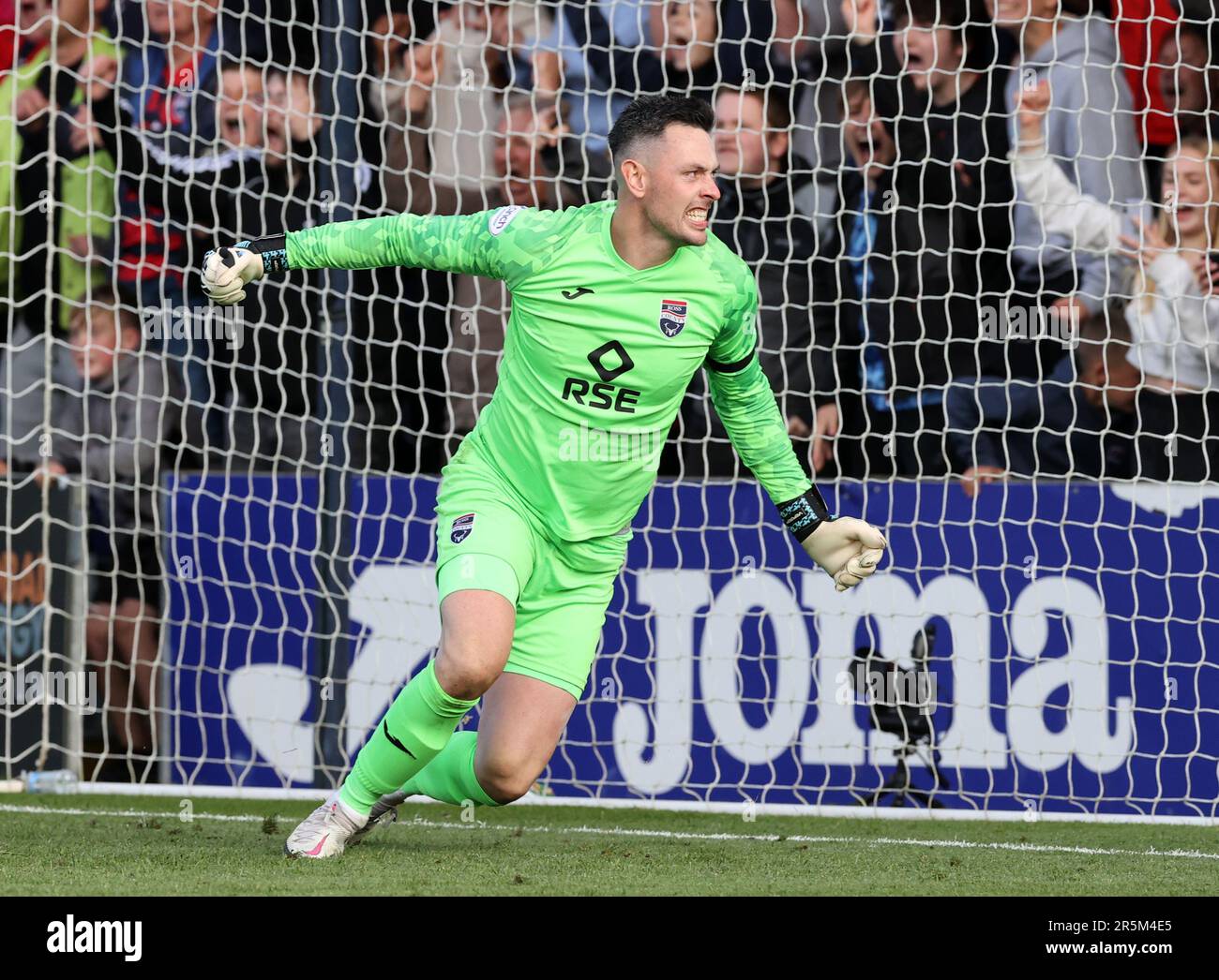 Ross County goalkeeper Ross Laidlaw saves a penalty from Partick Thistle's Kevin Holt inthe shoot-out following the cinch Premiership second leg play-off final match at the Global Energy Stadium, Dingwall. Picture date: Sunday June 4, 2023. Stock Photo