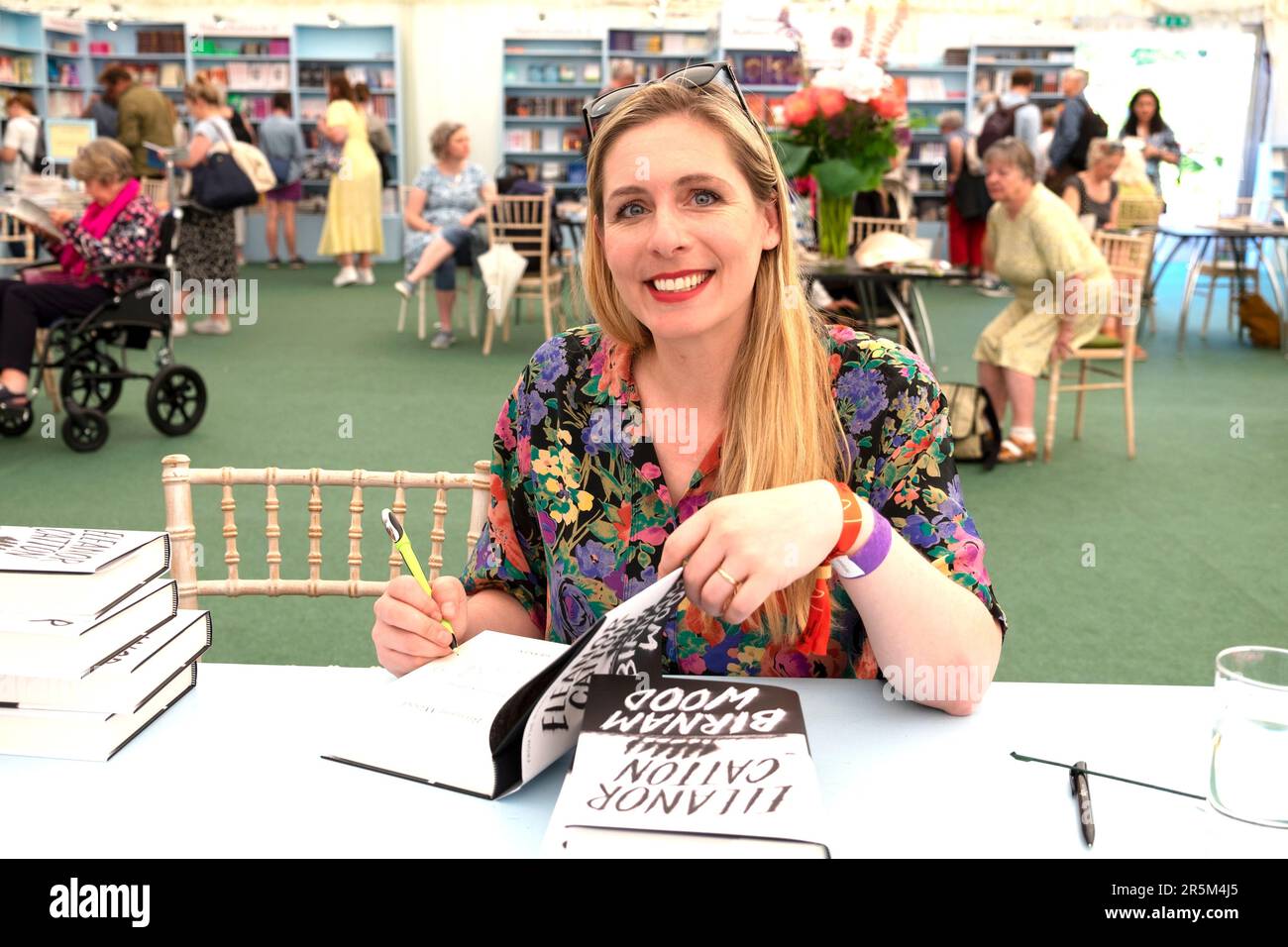 Novelist Eleanor Catton author of Birnam Wood book signing at the Hay Festival 2023 in the bookstore at Hay-on-Wye Wales UK Great Britain KATHY DEWITT Stock Photo
