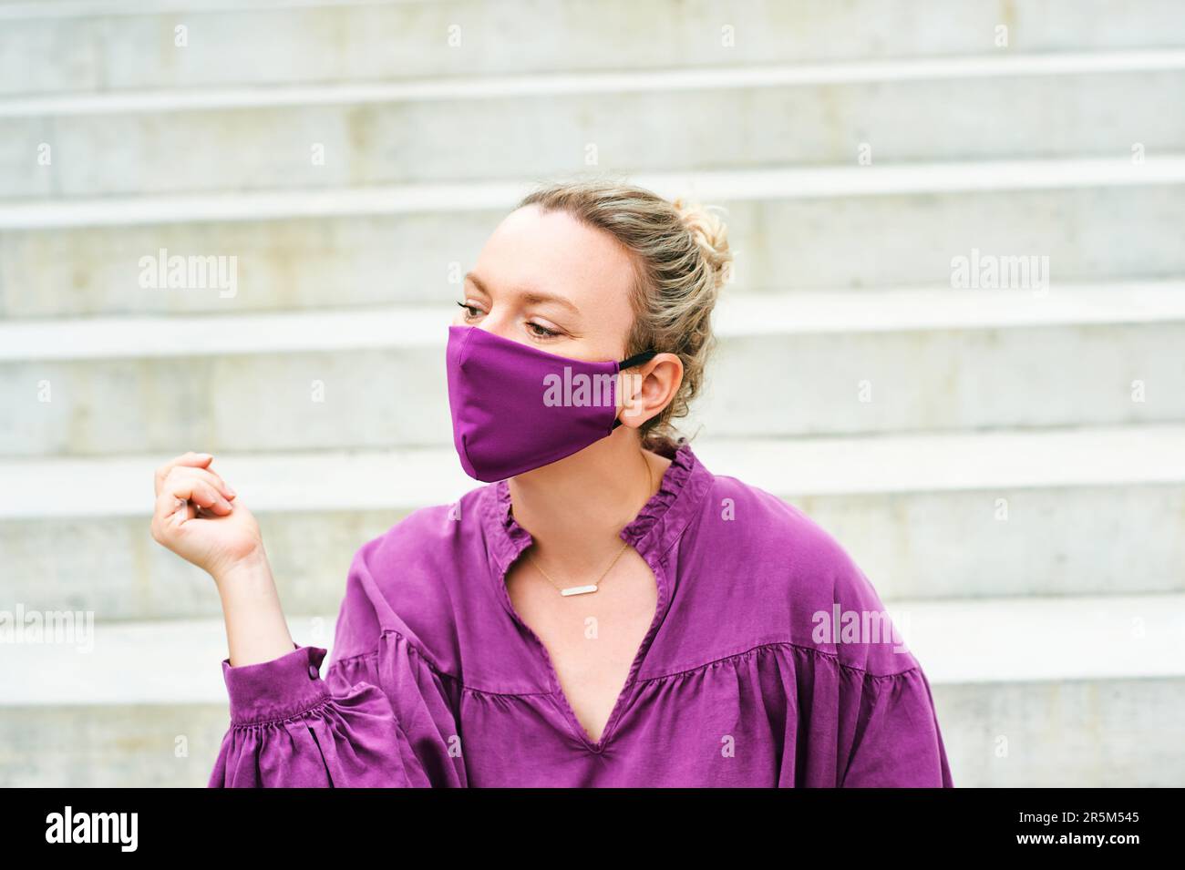 Mature woman wearing facial mask hi-res stock photography and images ...