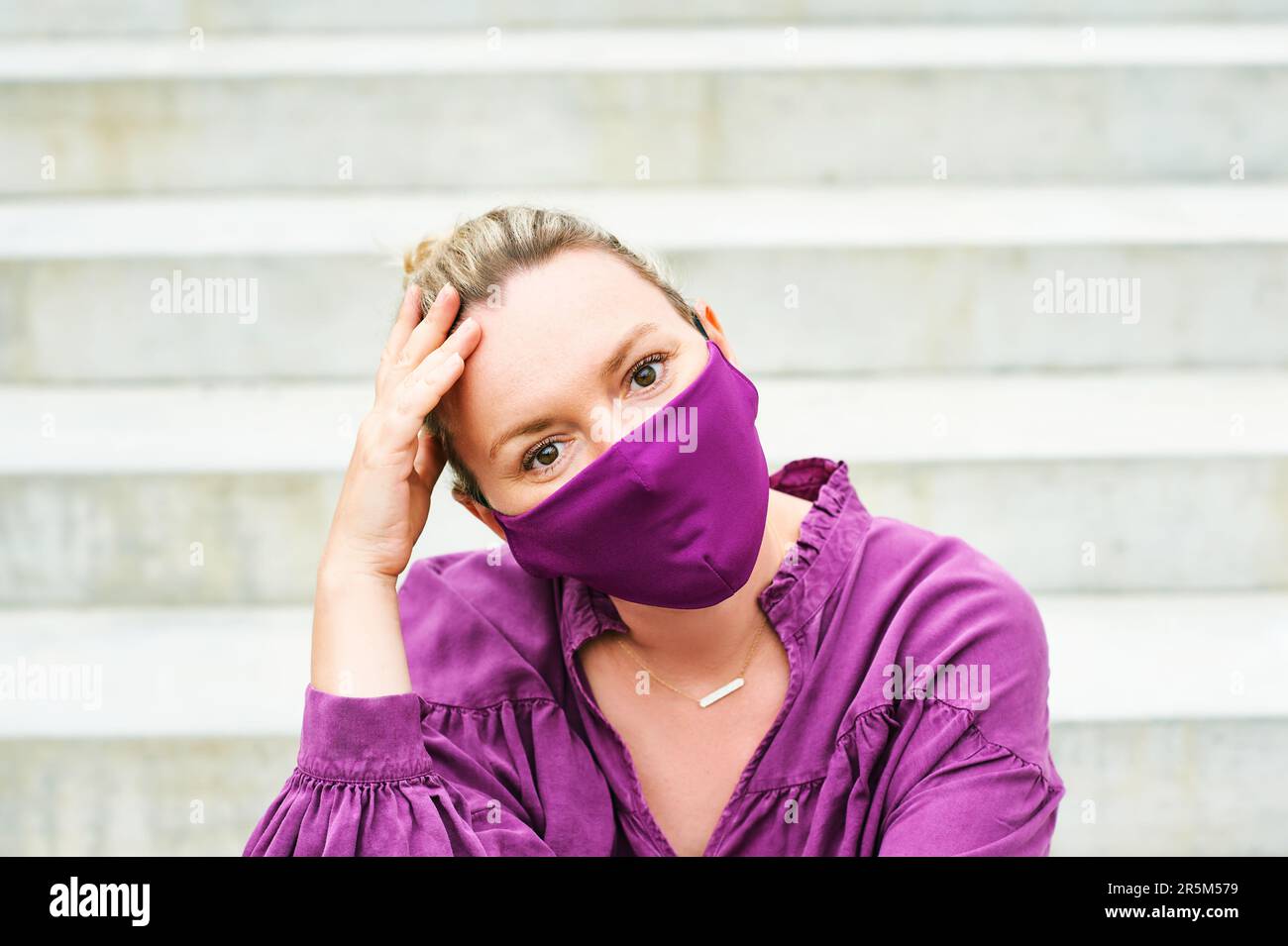 Mature woman wearing facial mask hi-res stock photography and images ...