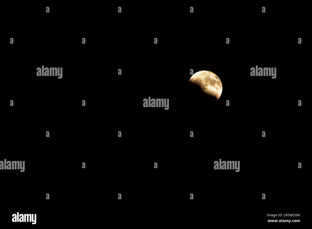 Srinagar, India. 05th June, 2023. The full Strawberry Moon rises in