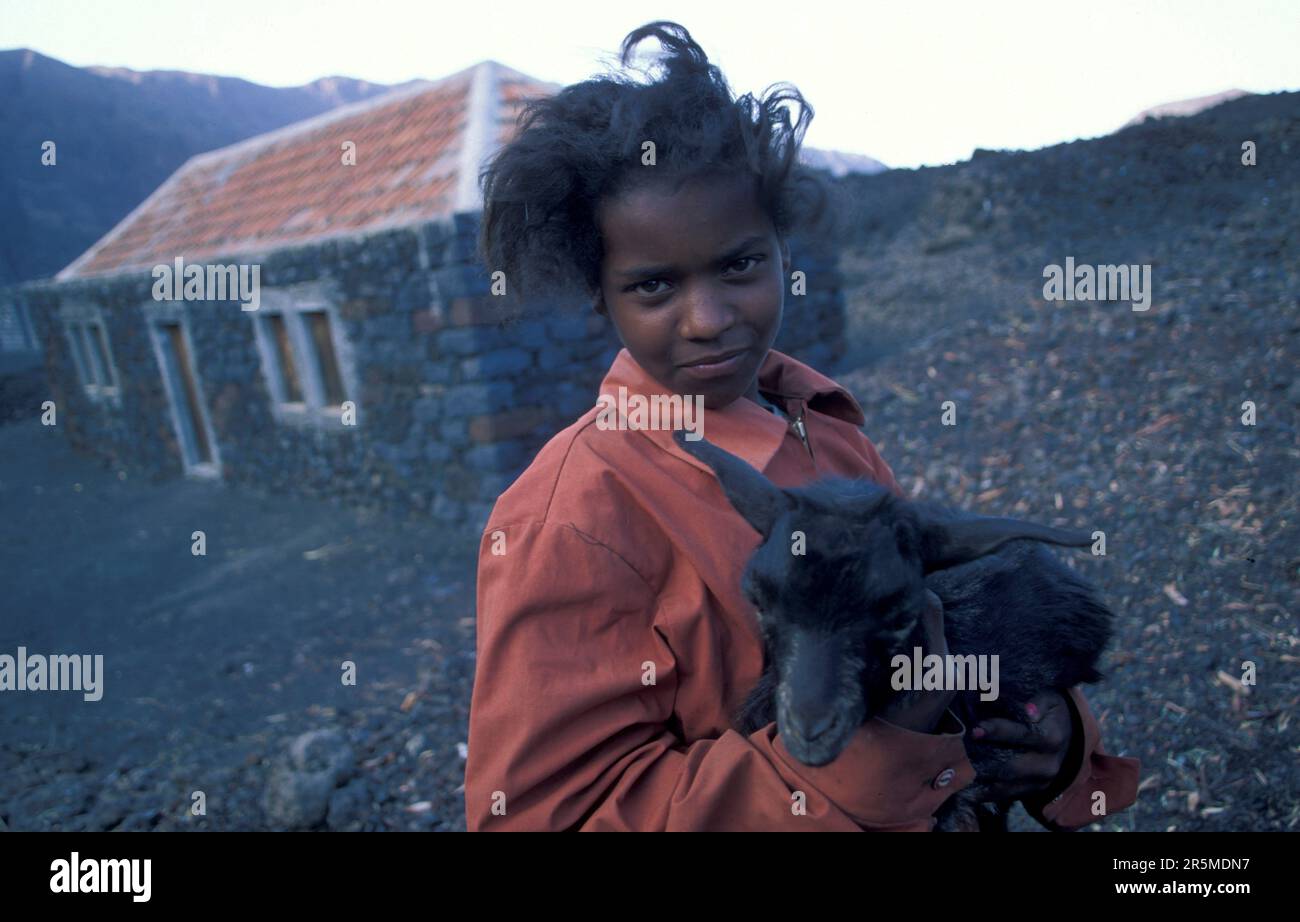 a girl with a Goat at the Cater Village in the big Crater of the ...