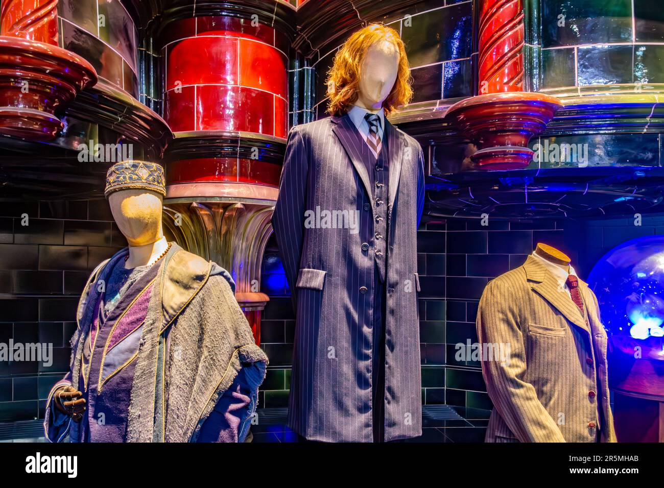 Mannequins wearing costumes worn by the actors who portrayed ministers of magic on display at