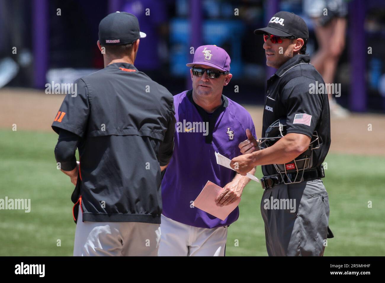 Mississippi State's Hunter Renfroe (34) is greeted by teammates