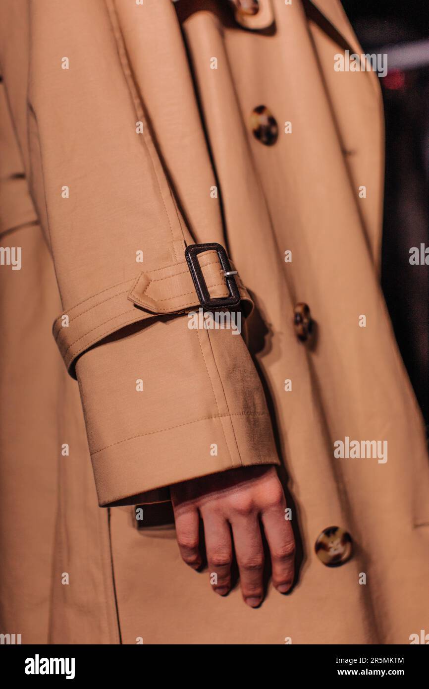 Details of autumn brown classy coat. Unisex street style fashion cloth concept Stock Photo