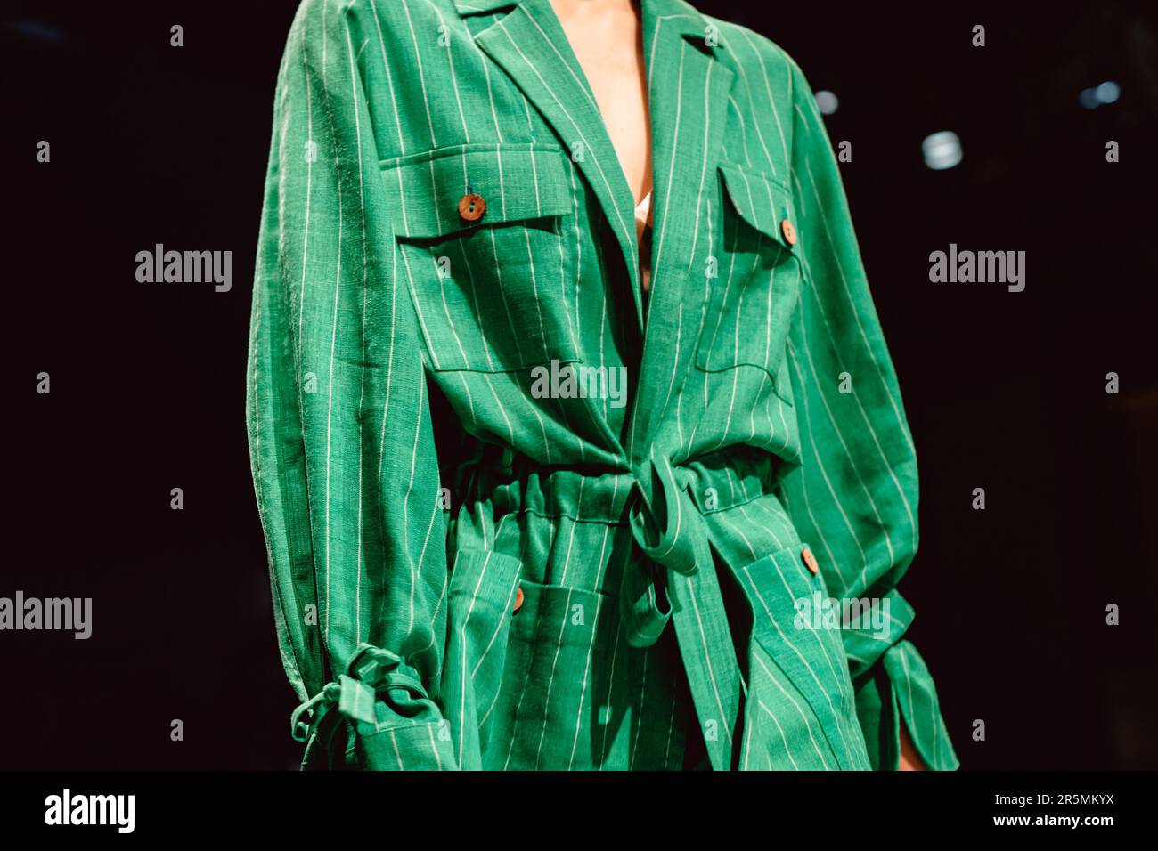 Fashion details of stylish green cotton jacket. Classy blazer. Fancy cloth concept Stock Photo